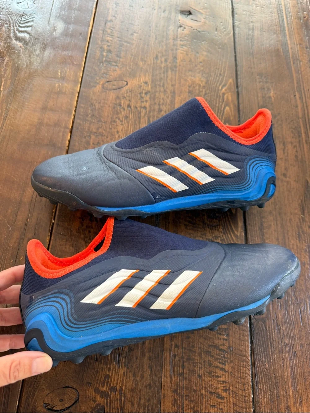 COPA adidas Navy Athletic Soccer Shoes with Orange Trim